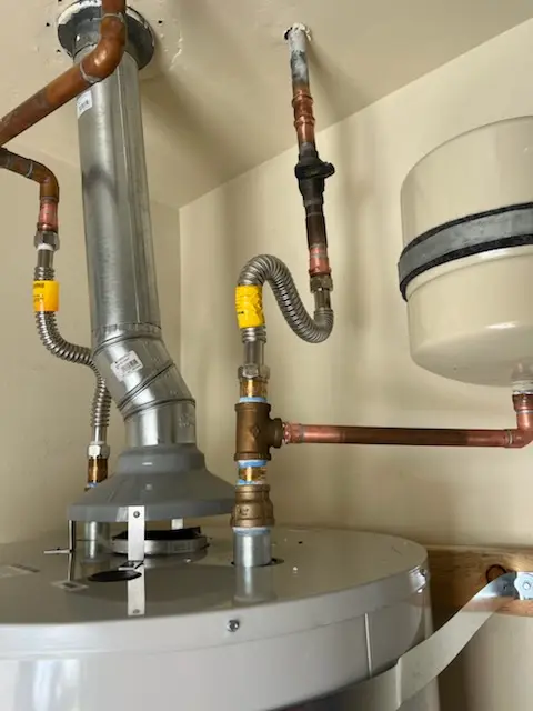 Water heater installation and plumbing repair in Strickland